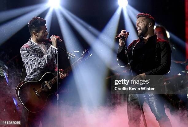 Recording artists Draco Rosa and Ricky Martin perform onstage during The 14th Annual Latin GRAMMY Awards at the Mandalay Bay Events Center on...