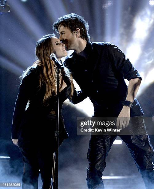 Recording artists Enrique Iglesias and India Martinez perform onstage during The 14th Annual Latin GRAMMY Awards at the Mandalay Bay Events Center on...