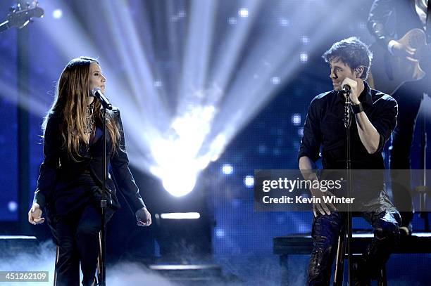 Recording artists Enrique Iglesias and India Martinez perform onstage during The 14th Annual Latin GRAMMY Awards at the Mandalay Bay Events Center on...