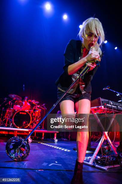 Emily Haines of Metric performs in concert at The Palace of Auburn Hills on November 21, 2013 in Auburn Hills, Michigan.