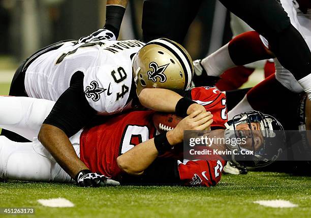 Defensive end Cameron Jordan of the New Orleans Saints sacks quarterback Matt Ryan of the Atlanta Falcons during a game at the Georgia Dome on...