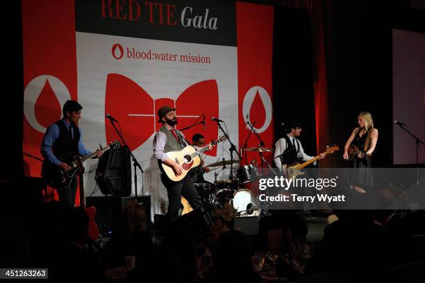 Drew Holcomb and the Neighbors perform during the Red Tie Gala Hosted by Blood:Water Mission and sponsored by Noodle & Boo at Hutton Hotel on...