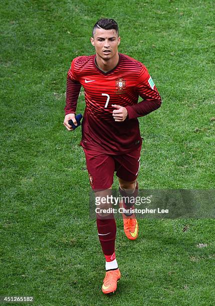 Cristiano Ronaldo of Portugal walks off the pitch at half-time during the 2014 FIFA World Cup Brazil Group G match between Portugal and Ghana at...
