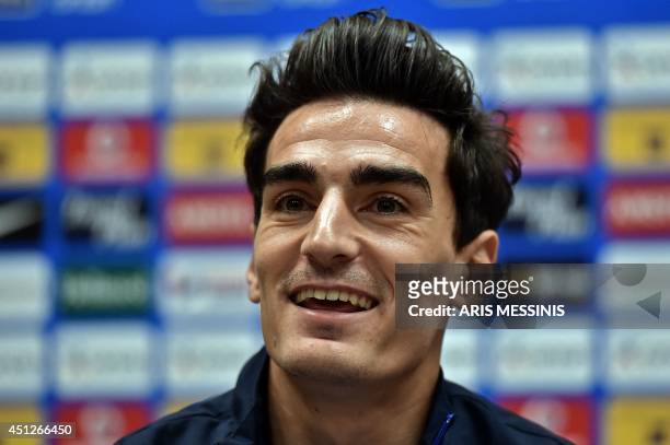 Greece's midfielder Lazaros Christodoulopoulos smiles during a press conferense in Aracaju on June 26, 2014 during the 2014 FIFA World Cup in Brazil....