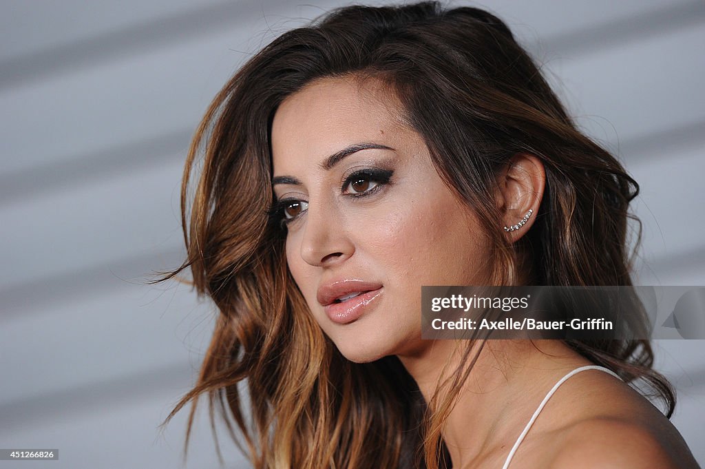 Actress Noureen DeWulf arrives at the MAXIM Hot 100 Celebration Event