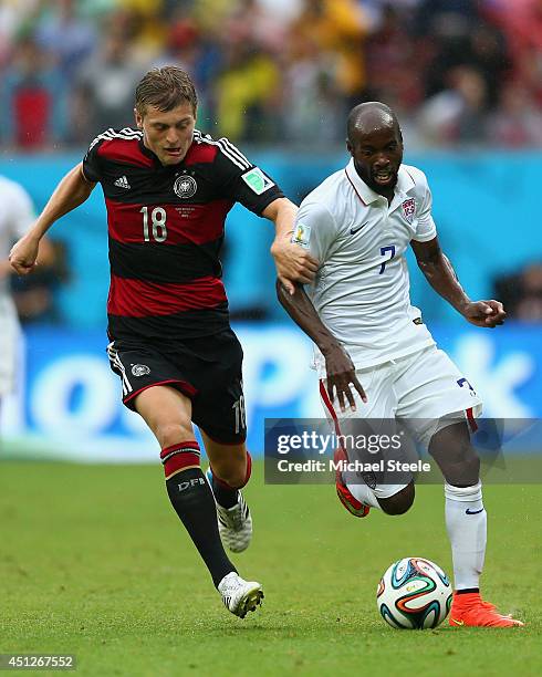 Toni Kroos of Germany challenges DaMarcus Beasley of the United States during the 2014 FIFA World Cup Brazil group G match between the United States...