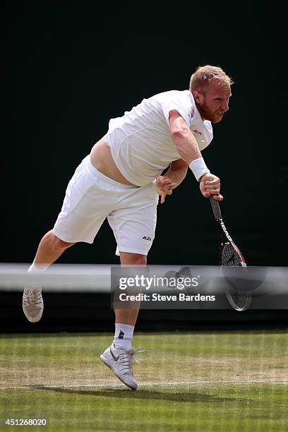 Lukas Dlouhy of Czech Republic during his Gentlemen's Doubles first round match with Paul Hanley of Australia against Santiago Gonzalez of Mexico and...