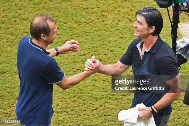 Head coaches Jurgen Klinsmann of the United States and Joachim Loew of Germany shake hands after Germany's 1-0 win during the 2014 FIFA World Cup...