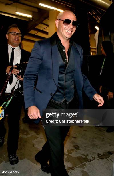 Recording artist Pitbull walks backstage during the 14th Annual Latin GRAMMY Awards held at the Mandalay Bay Events Center on November 21, 2013 in...