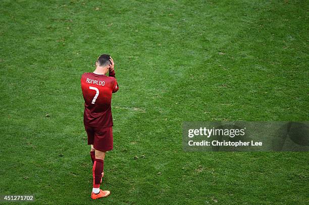 Cristiano Ronaldo of Portugal looks dejectec after the 2014 FIFA World Cup Brazil Group G match between Portugal and Ghana at Estadio Nacional on...