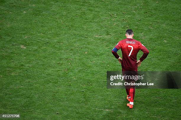 Cristiano Ronaldo of Portugal looks dejectec after the 2014 FIFA World Cup Brazil Group G match between Portugal and Ghana at Estadio Nacional on...