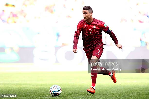 Cristiano Ronaldo of Portugal controls the ball during the 2014 FIFA World Cup Brazil Group G match between Portugal and Ghana at Estadio Nacional on...