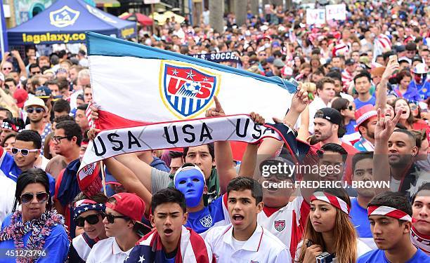 Fans gathered show their support while gathered to watch off a big screen at Hermosa Beach, California on June 26 as Thomas Muller scored the lone...