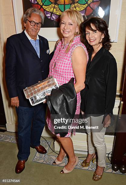 Rob Dickins, Judy Craymer and Cherry Gillespie attend a drinks reception hosted by The House Of Britannia to celebrate their new joint venture with...