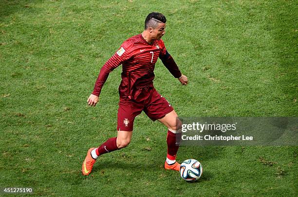 Cristiano Ronaldo of Portugal controls the ball during the 2014 FIFA World Cup Brazil Group G match between Portugal and Ghana at Estadio Nacional on...