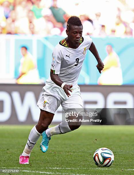 Asamoah Gyan of Ghana controls the ball during the 2014 FIFA World Cup Brazil Group G match between Portugal and Ghana at Estadio Nacional on June...