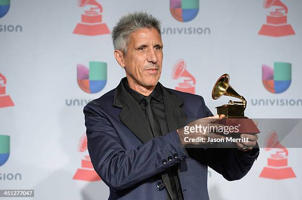 Songwriter Cachorro Lopez, winner of Best Rock Song for 'Creo Que Me Enamore' poses in the press room at the 14th Annual Latin GRAMMY Awards held at...