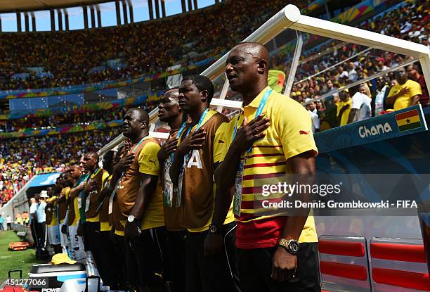 Head coach James Kwesi Appiah of Ghana and team staffs line up for the national anthem prior to the 2014 FIFA World Cup Brazil Group G match between...