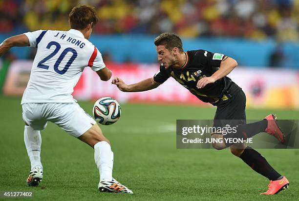 Belgium's forward Dries Mertens vies with South Korea's defender Hong Jeong-Ho during a Group H football match between South Korea and Belgium at the...
