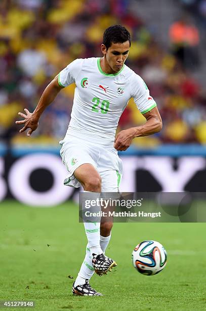 Aissa Mandi of Algeria controls the ball during the 2014 FIFA World Cup Brazil Group H match between Algeria and Russia at Arena da Baixada on June...