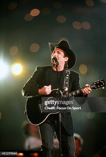 Clint Black preforms during the halftime show of Super Bowl XXVIII between the Dallas Cowboys and Buffalo Bills on January 30, 1994 at the Georgia...