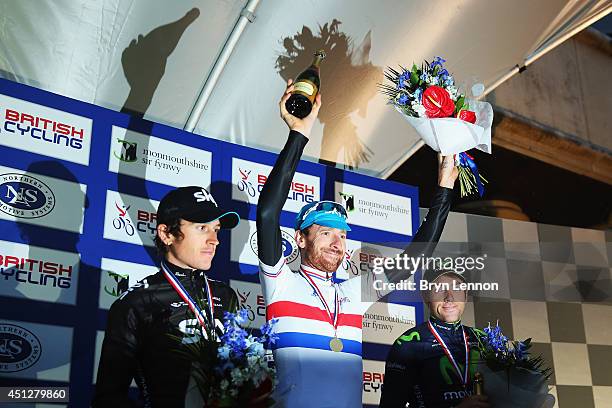 Geraint Thomas of Team SKY, Sir Bradley Wiggins of Team Sky and Great Britain and Alex Dowsett of Team Movisaytr stand in the podium after the Elite...
