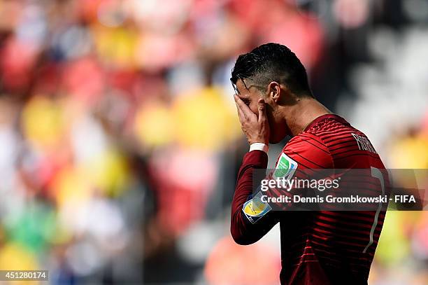 Cristiano Ronaldo of Portugal reacts during the 2014 FIFA World Cup Brazil Group G match between Portugal and Ghana at Estadio Nacional on June 26,...