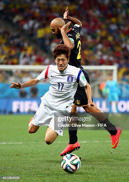 Lee Chung-Yong of South Korea is brought down by Anthony Vanden Borre of Belgium during the 2014 FIFA World Cup Brazil Group H match between Korea...