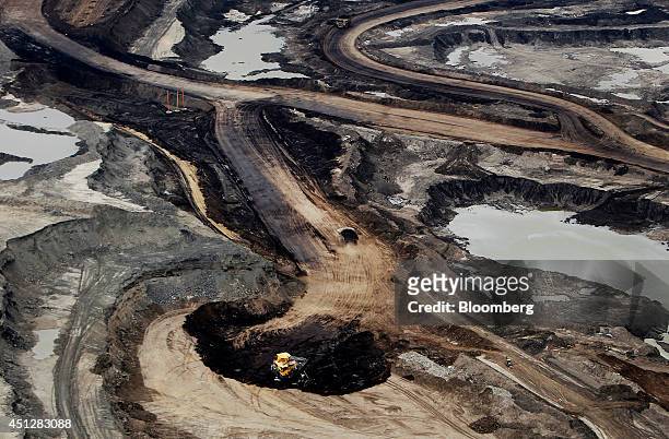 The Syncrude Canada Ltd. Mine is seen in this aerial photograph taken above the Athabasca Oil Sands near Fort McMurray, Alberta, Canada, on...
