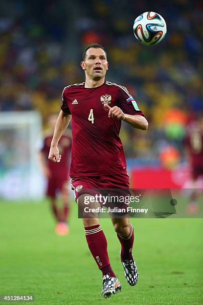 Sergey Ignashevich of Russia controls the ball during the 2014 FIFA World Cup Brazil Group H match between Algeria and Russia at Arena da Baixada on...