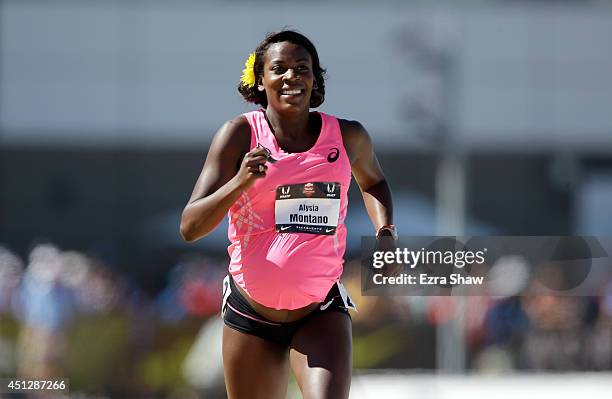 Pregnant Alysia Montano runs in the opening round of the women's 800 meter run during day 2 of the USATF Outdoor Championships at Hornet Stadium on...