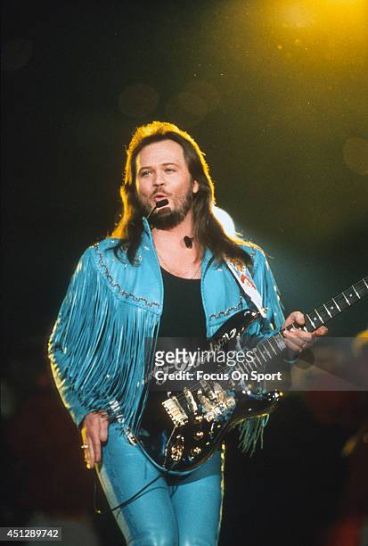 Travis Tritt preforms during the halftime show of Super Bowl XXVIII between the Dallas Cowboys and Buffalo Bills on January 30, 1994 at the Georgia...