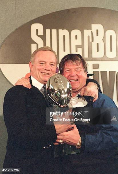 Owner Jerry Jones of the Dallas Cowboys and head coach Jimmy Johnson with the Vince Lombardi Trophy after the defeated the Buffalo Bills in Super...