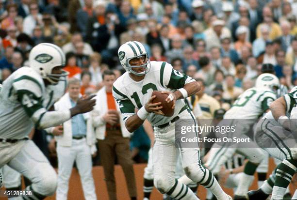 Joe Namath of the New York Jets drops back to pass against the Baltimore Colts during Super Bowl III at the Orange Bowl on January 12, 1969 in Miami,...