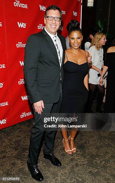 Richard LaGravenese and Nia Long attend "The Divide" series premiere at Dolby 88 Theater on June 26, 2014 in New York City.