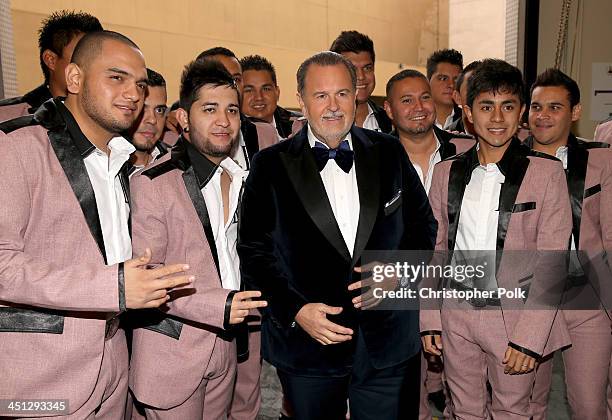 Personality Raul De Molina and recording artists Banda Carnaval arrive at the 14th Annual Latin GRAMMY Awards held at the Mandalay Bay Convention...