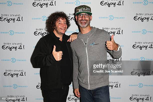 Comedians Jeff Ross and Brody Stevens arrive at the "Brody Stevens: Enjoy It!" Premiere Party at Smogshoppe on November 21, 2013 in Los Angeles,...