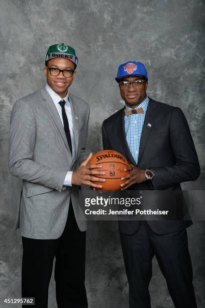 Thanasis Antetokounmpo and Giannis Antetokounmpo poses for a portrait with his brother during the 2014 NBA Draft at the Barclays Center on June 26,...