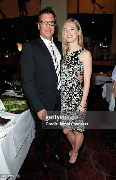 Series creator Richard LaGravenese and actress Marin Ireland attend "The Divide" series premiere after party at Circo on June 26, 2014 in New York...