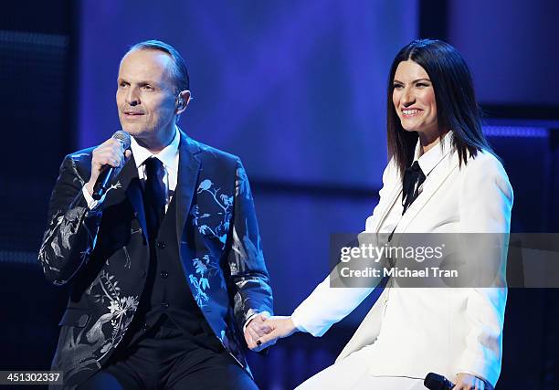 Miguel Bose and Laura Pausini perform onstage during the 14th Annual Latin GRAMMY Awards held at Mandalay Bay Resort and Casino on November 21, 2013...
