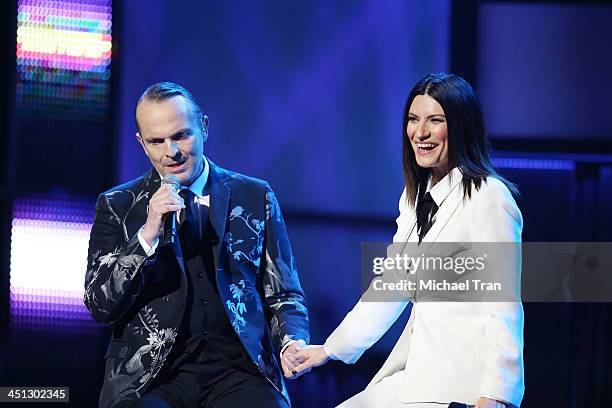 Miguel Bose and Laura Pausini perform onstage during the 14th Annual Latin GRAMMY Awards held at Mandalay Bay Resort and Casino on November 21, 2013...