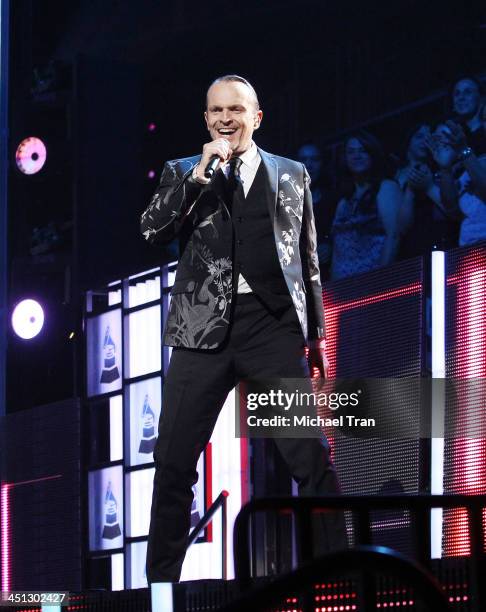 Miguel Bose performs onstage during the 14th Annual Latin GRAMMY Awards held at Mandalay Bay Resort and Casino on November 21, 2013 in Las Vegas,...