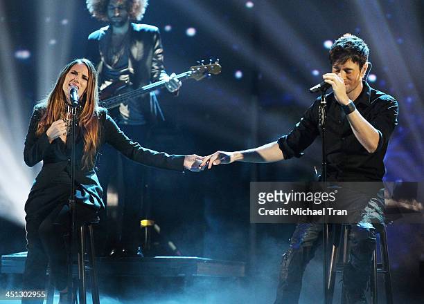India Martinez and Enrique Iglesias peform onstage during the 14th Annual Latin GRAMMY Awards held at Mandalay Bay Resort and Casino on November 21,...