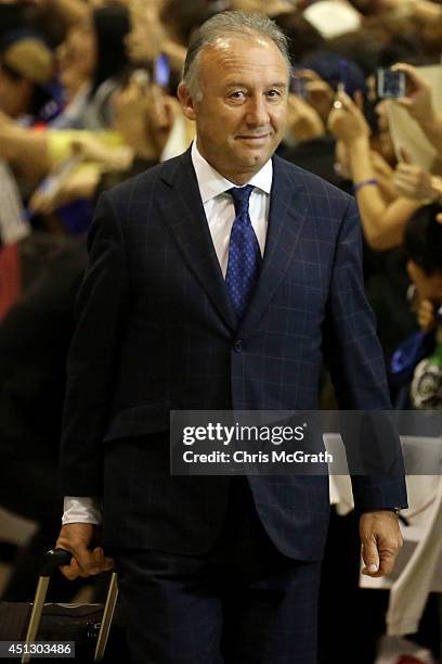 Japan national football coach Alberto Zaccheroni is seen upon arrival back from the World Cup 2014 Brazil at Narita International Airport on June 27,...