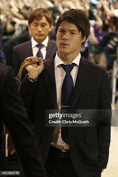 Gotoku Sakai of Japan is seen upon arrival back from the World Cup 2014 Brazil at Narita International Airport on June 27, 2014 in Narita, Japan.
