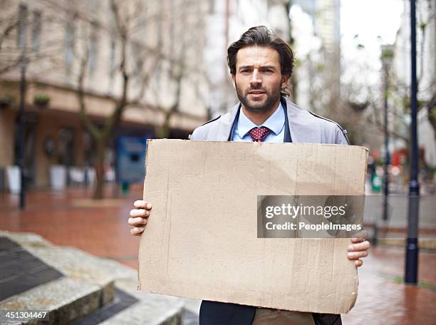 will give financial advice for food! - man holding placard stock pictures, royalty-free photos & images