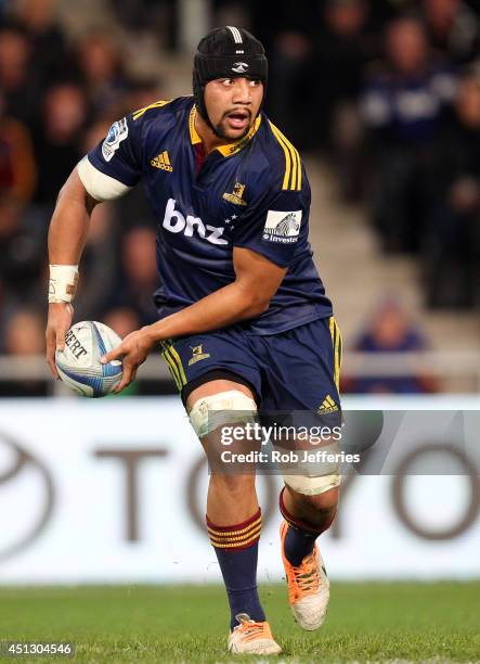 Nasi Manu of the Highlanders passes the ball during the round 17 Super Rugby match between the Highlanders and the Chiefs at Forsyth Barr Stadium on...