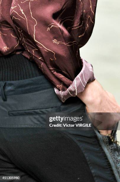 Model walks the runway during the Dries Van Noten show as part of Paris Fashion Week Menswear Spring/Summer 2015 on June 26, 2014 in Paris, France.