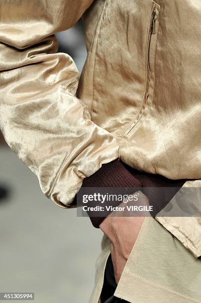 Model walks the runway during the Dries Van Noten show as part of Paris Fashion Week Menswear Spring/Summer 2015 on June 26, 2014 in Paris, France.