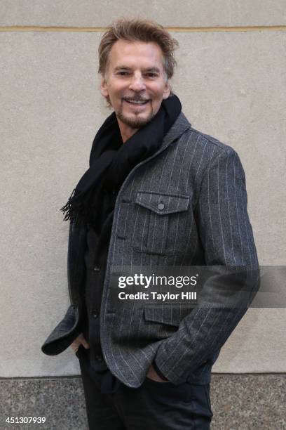 Musician Kenny Loggins poses for a private photo shoot in Rockefeller Center on November 21, 2013 in New York City.
